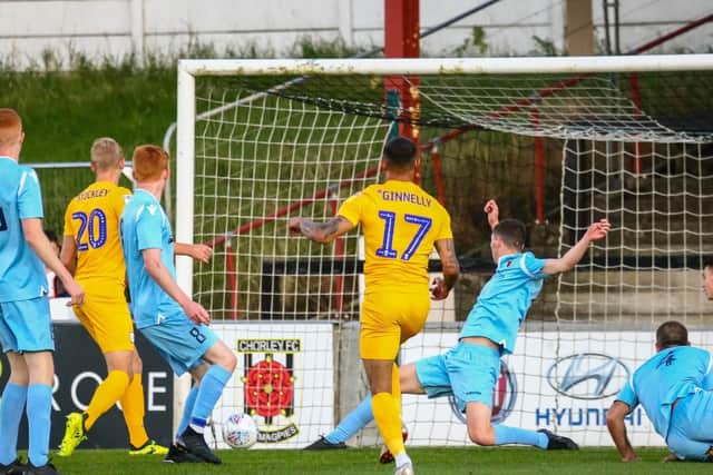 Josh Ginnelly scores PNE's second goal at Chorley Picture: Stefan Willoughby