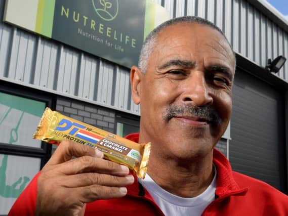 Daley Thompson with the new nuitrition bar DT10 Daley Protein