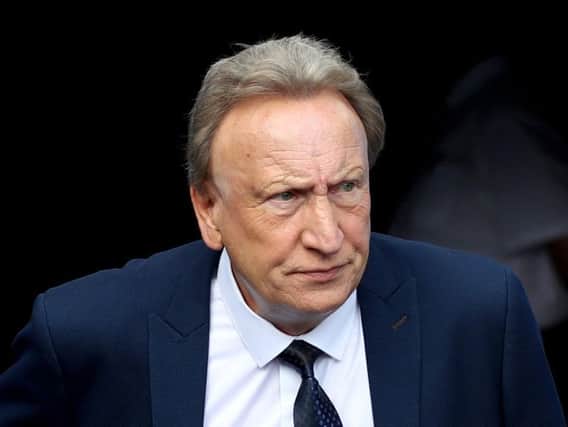 Cardiff City manager Neil Warnock has admitted that he's missing Aron Gunnarsson's dressing room influence at the club, following his exit to Qatari club Al-Arabi over the summer.