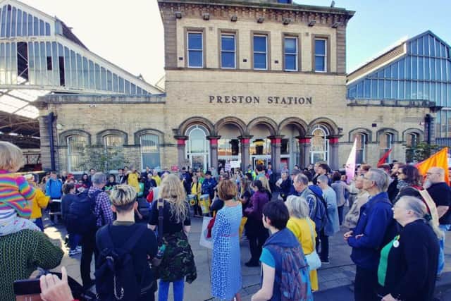 Crowd of climate change activists outside Preston Railway Station