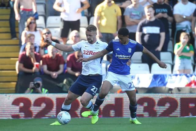 Preston centre-back Patrick Bauer challenges Birmingham midfielder Jude Bellingham