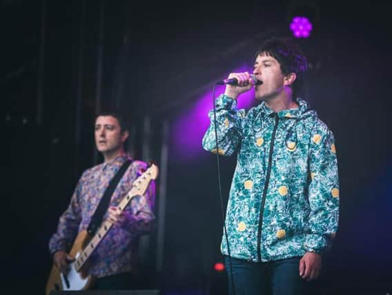 Bassist Mike Lott and singer Spencer Davies of tribute act The Ultimate Stone Roses, who are heading to Bamber Bridge Football Club for a celebratory gig next week.