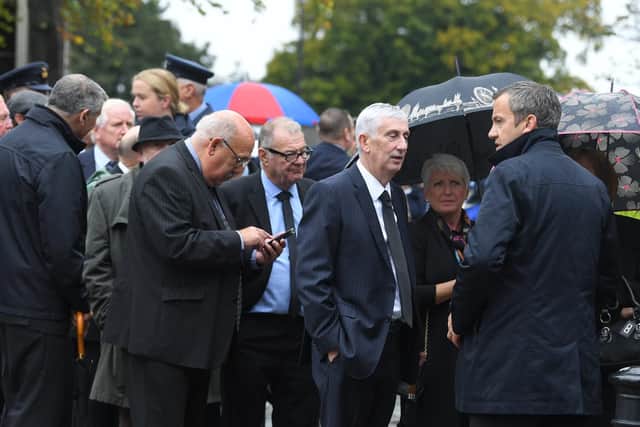Mourners, including Chorley MP Sir Lindsay Hoyle, gather