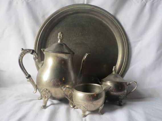 This vintage pewter set has a tray, coffee pot, milk jug, and sugar bowl