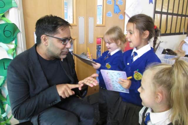 Preston Councillor Pav Akhtar gets a grilling from young eco-warriors at Eldon Primary School