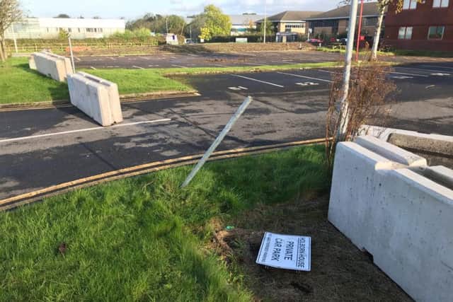 'Private car park' signs at Holborn House in Caxton Road, Fulwood Business Park have been vandalised after travellers were asked to vacate the site