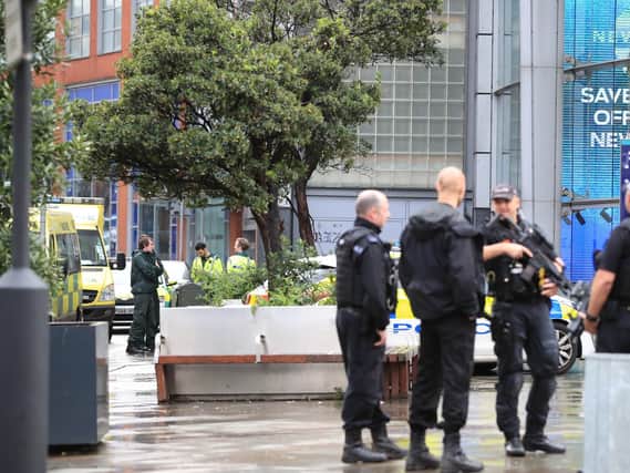 Paramedics outside the Arndale Centre in Manchester where at least five people have been treated after a stabbing incident. Pic: PA