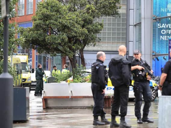 Paramedics outside the Arndale Centre in Manchester where at least five people have been treated after a stabbing incident (Peter Byrne/PA Wire)