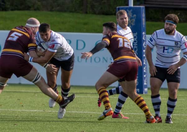 Action from Hoppers' defeat by Huddersfield (photos: Mike Craig)