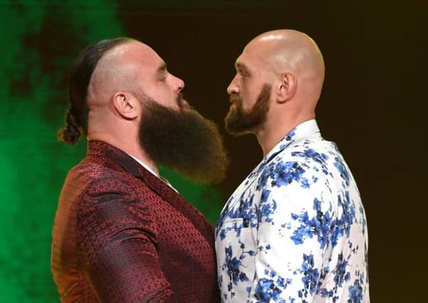 WWE wrestler Braun Strowman (left) and heavyweight boxer Tyson Fury face off (Getty Images)
