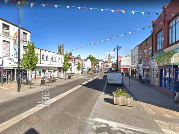 Two boys - aged 17 and 16 - and a girl, 14, have been arrested after shops and cars were damaged in Market Street, Chorley at around 1.40am this morning (October 15)