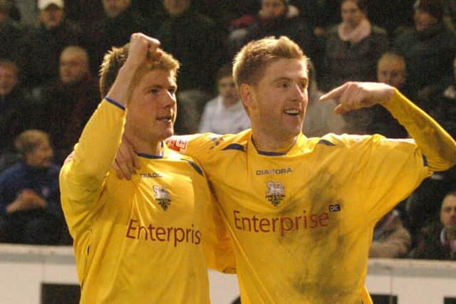 Neil Mellor celebrates with Paul Gallagher when PNE beat Burnley in December 2007