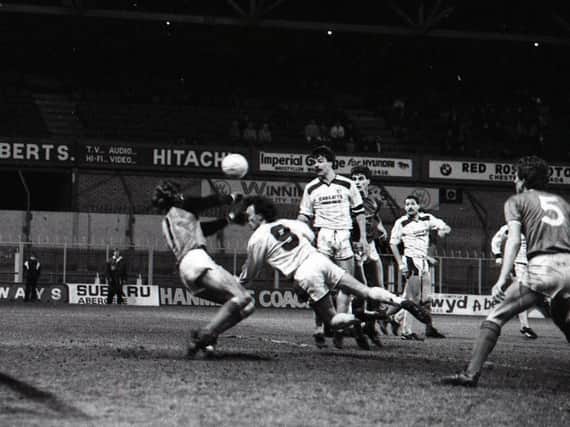 Preston striker John Thomas heads home the equaliser at Wrexham in the Feight Rover Trophy clash at the Racecourse Ground