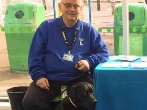 Alan Hughes with his guide dog Mandy