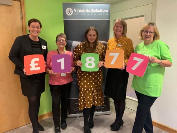 Claire Hamilton, Head of Vincents Solicitors Chorley office with Eileen Murray and Abi Williamson from Derian House, Garstangs YBS cashier Virginia Webster, and Elaine Middleton from Derian House.