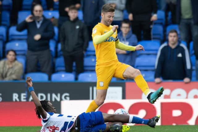 Paul Gallagher rides a challenge from Ovie Ejaria