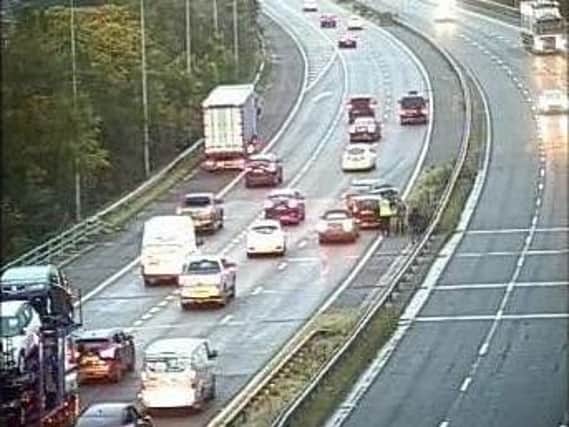 Lane 2 (of 2) is blocked on the M61 near Brindle, Chorley after a collision on the approach to the M6. Pic: Highways England