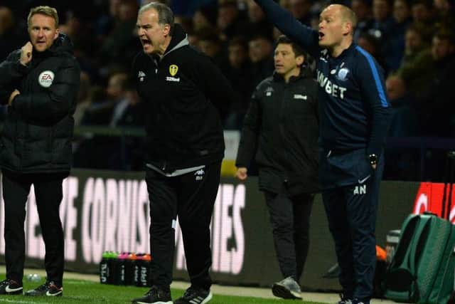Preston boss Alex Neil and his Leeds counterpart Marcelo Bielsa at Deepdale