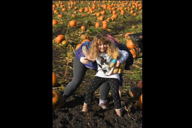 Yasmin Coggins, 7, stuck in the mud