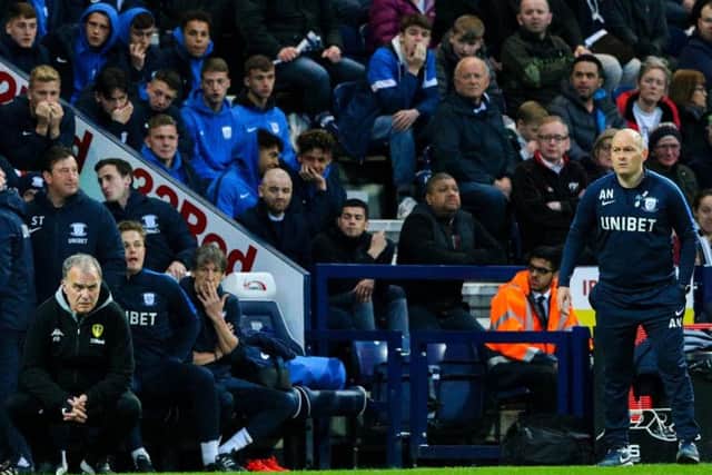 Marcelo Bielsa and Alex Neil on the touchline at Deepdale last season