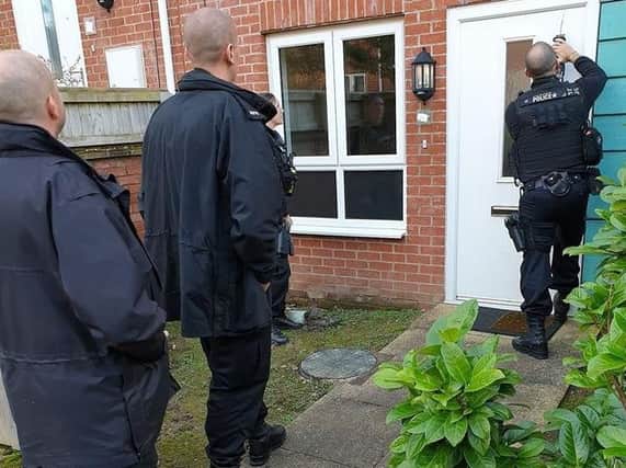 A 27-year-old man has been arrested and is in custody after a raid on a home in Ashton this morning (October 21). Pic: Lancashire Police