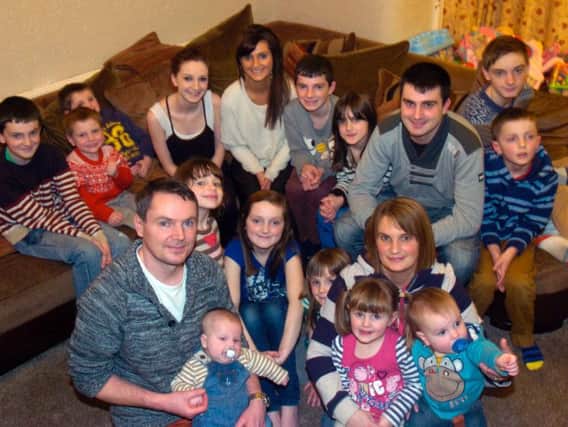 Noel and Sue Radford in 2014 with their then 16 children
