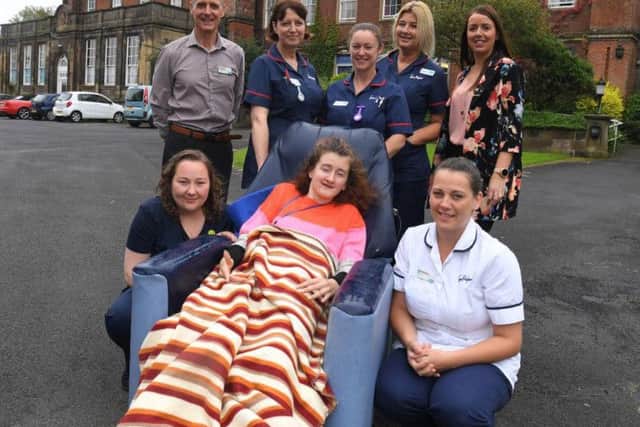 The Sue Ryder team with Heather Barker (centre), who has juvenile Huntingtons disease