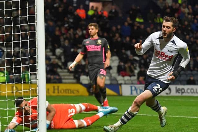 Tom Barkhuizen turns to celebrate after giving Preston the lead