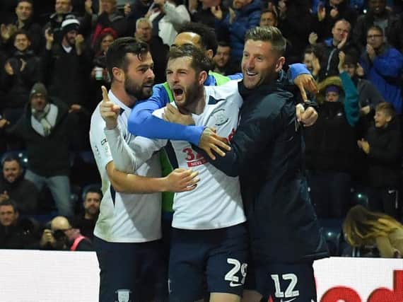 Tom Barkhuizen is congratulated by Joe Rafferty and Paul Gallagher after scoring for Preston against Leeds United at Deepdale