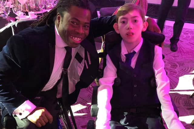 Alex Macpherson with Ade Adepitan, British television presenter and wheelchair basketball player