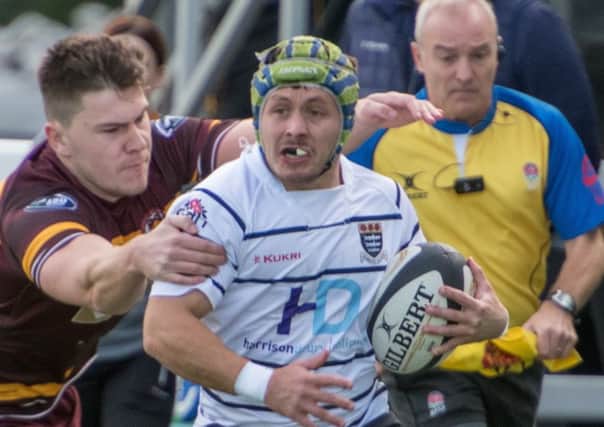 Action from Hoppers' recent defeat against Huddersfield (photo: Mike Craig)