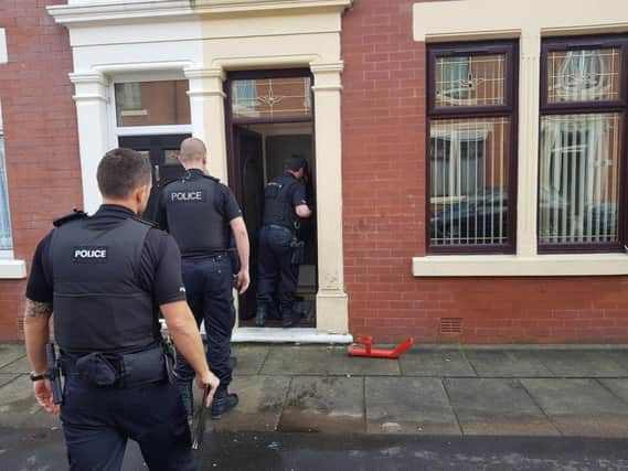 Police execute the warrants in Avenham