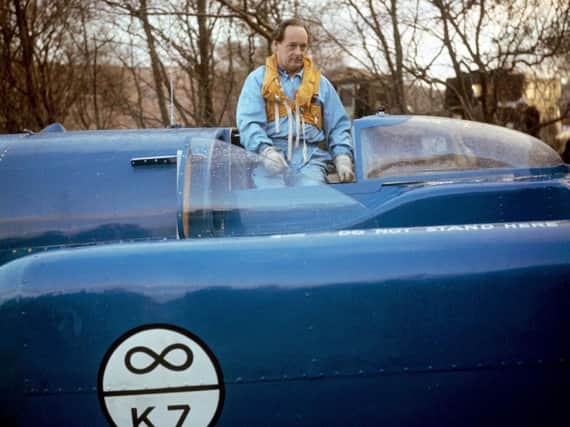Donald Campbell on his Bluebird K7 at Lake Coniston, Cumbria in 1966. Pic: PA Wire