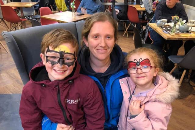 Helen Whaite with her children Daniel and Alex, who were transformed by a spot of face-painting.