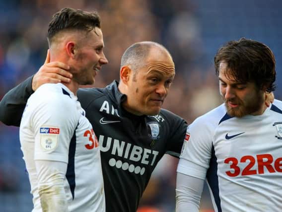 Preston boss Alex Neil with Alan Browne and Ben Pearson at the final whistle