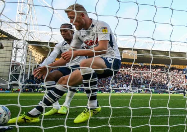 Jayden Stockley gathers the ball from the net after PNE's first goal
