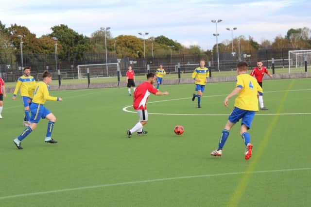 Two furniture companies in Preston took competition to the next level when they went head to head in a charity football match.