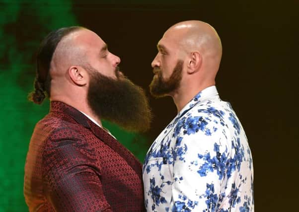 Tyson Fury (right) faces Braun Strowman