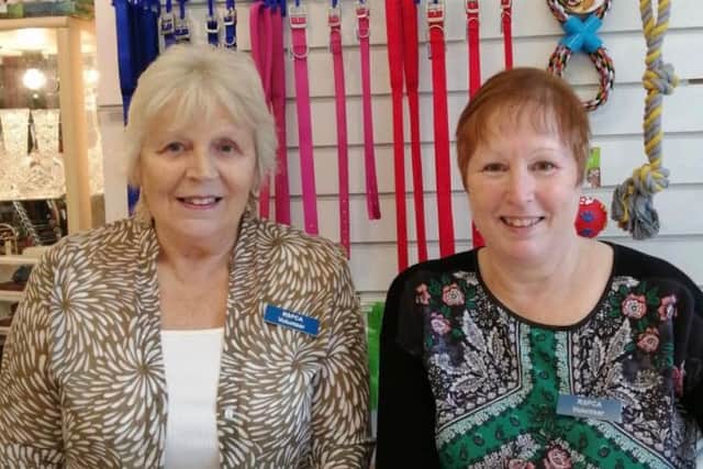 Pam Coulton and Chris Bell say they love volunteering at the RSPCA's shop in Longridge.