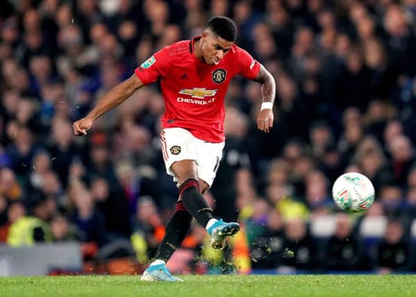 Marcus Rashford scores the winner against Chelsea and United's reward is a home tie against Colchester
