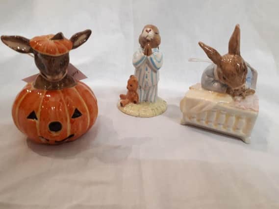 This collection includes a special edition 1993 Halloween Bunnykins peeking out from a pumpkin