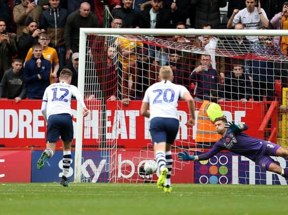 Paul Gallagher scores from the penalty spot for Preston against Charlton at The Valley