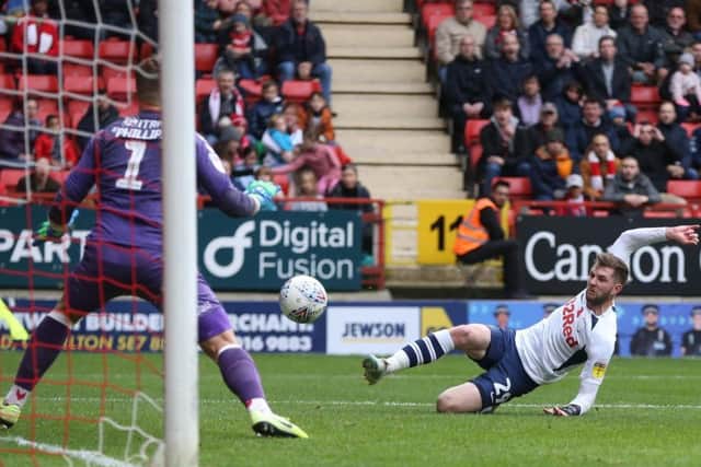 Preston winger Tom Barkhuizen slides in to have a shot against Charlton  at The Valley