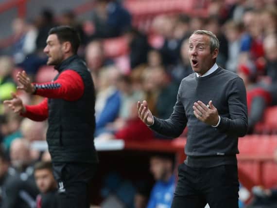 Lee Bowyer (right) gives out instructions during his side's 1-0 loss to Preston North End at the Valley.
