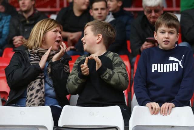 These PNE fans enjoy themselves at Charlton