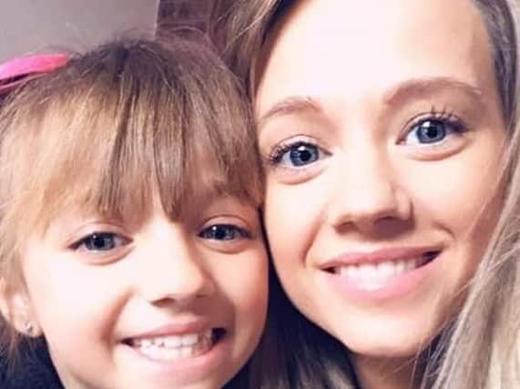 Alexandra Hodson, 26, from Wesham, who was diagnosed with cervical cancer and nine-year-old daughter, Ella