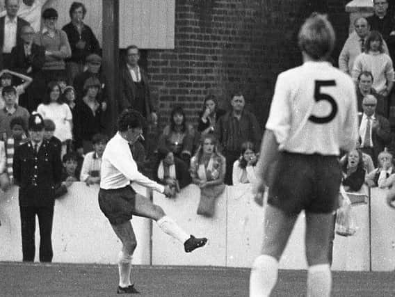 Alan Kelly (left) playing as an outfield player with his left arm in a sling against Oxford in September 1971 at Deepdale