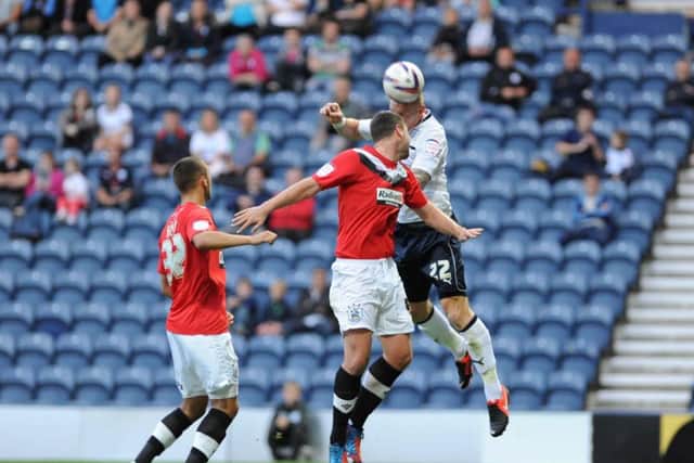 Jack King heads Preston into the lead against Huddersfield at Deepdale in August 2012