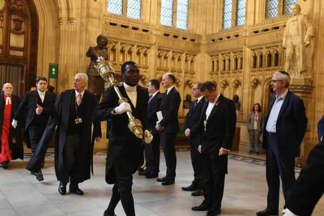 New Speaker of the House of Commons, Sir Lindsay Hoyle, greeted by MPs in the Members Lobby as he proceeds to the House of Commons chamber.