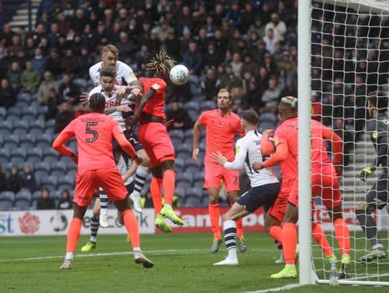 Patrick Bauer gets up high to head goalwards in PNE's win over Huddersfield